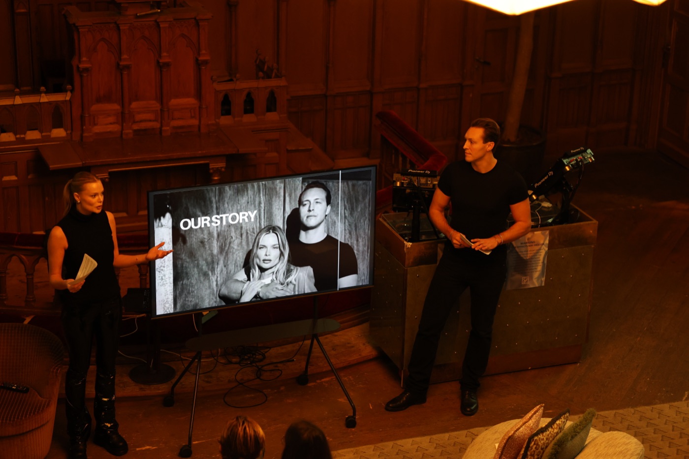 The two founders on stage telling the Thunder Honey story to a seated audience